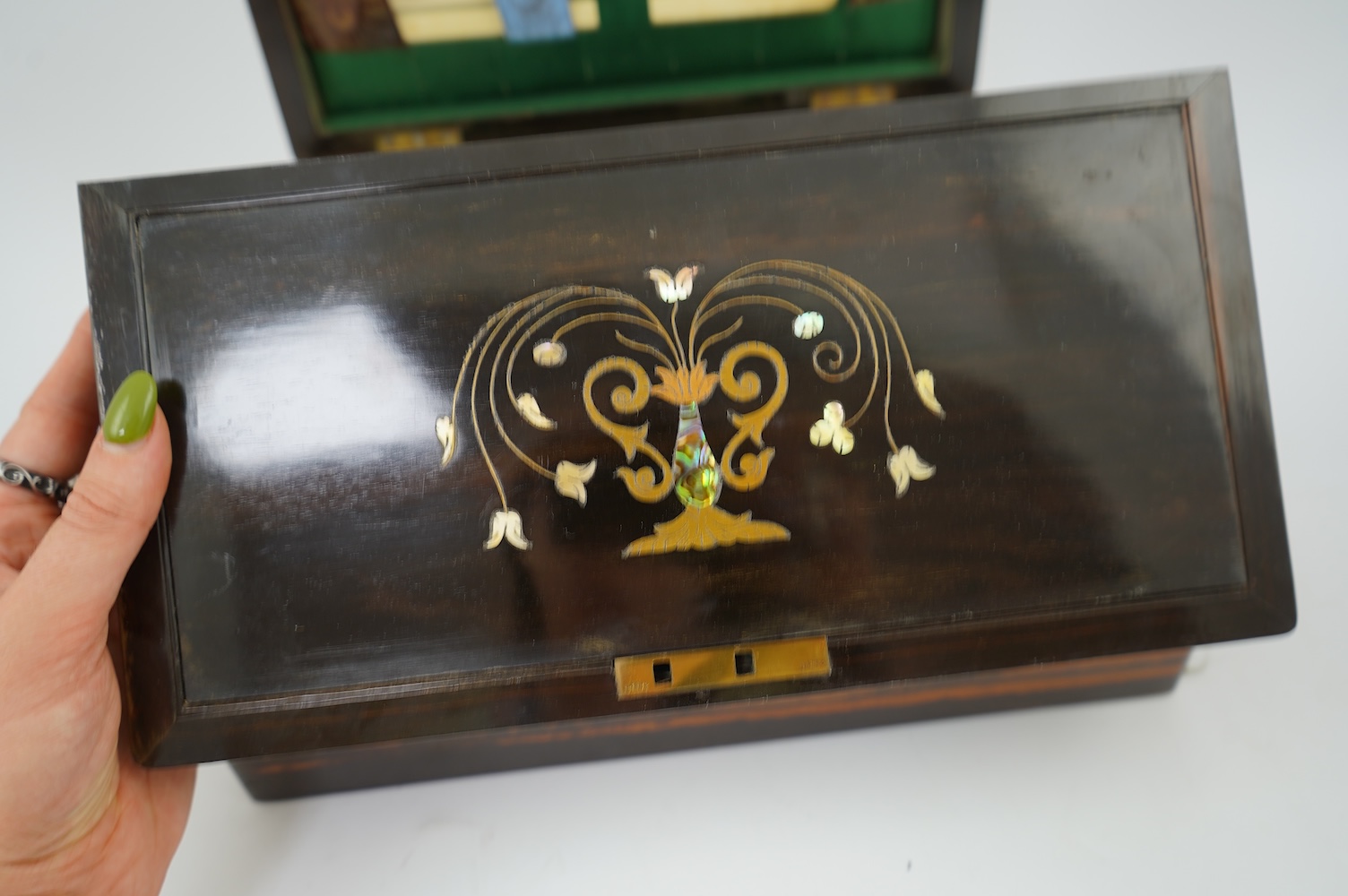A mid 19th century rosewood writing and sewing box